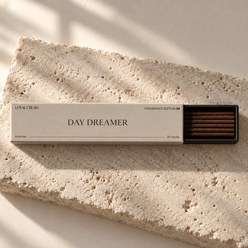 Loyal Crush Day Dreamer open incense box and sticks on pale stone