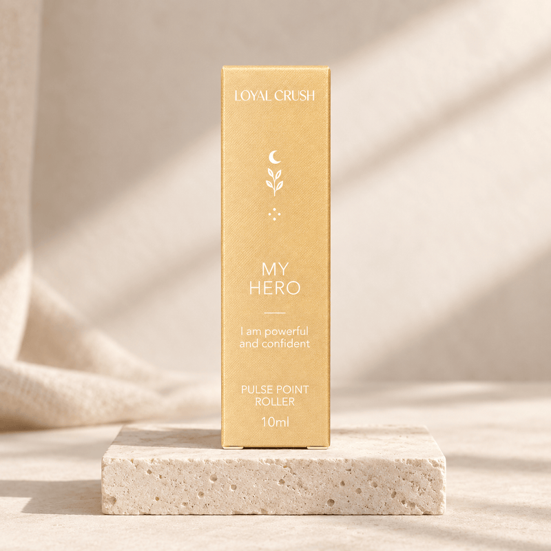 Loyal Crush my hero pulse point roller packaging on pale stone