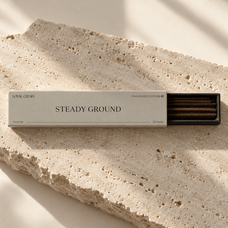 Loyal Crush Steady Ground open incense box and sticks on pale stone