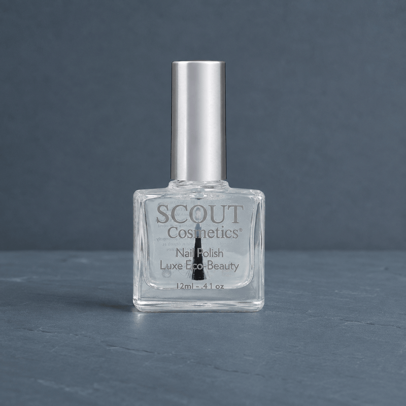 Scout Cosmetics Dual Base & Top Coat on a coloured studio background