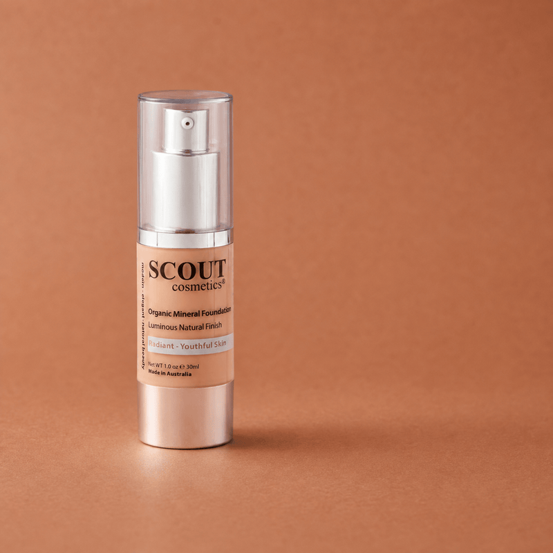 Scout Cosmetics Organic Healthy Glow Fluid Foundation - Almond on a coloured studio background