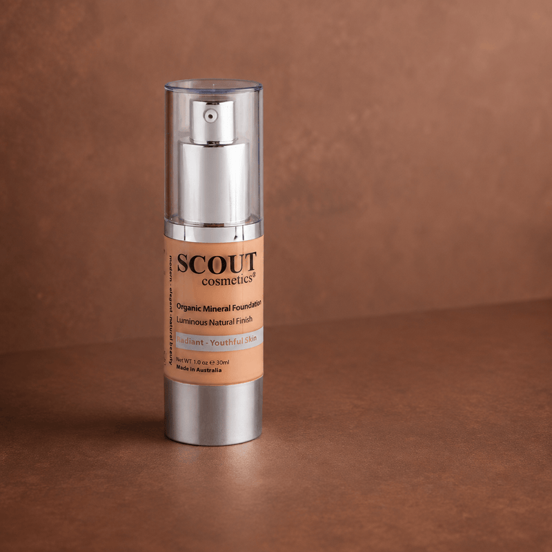 Scout Cosmetics Organic Healthy Glow Fluid Foundation - Golden on a coloured studio background