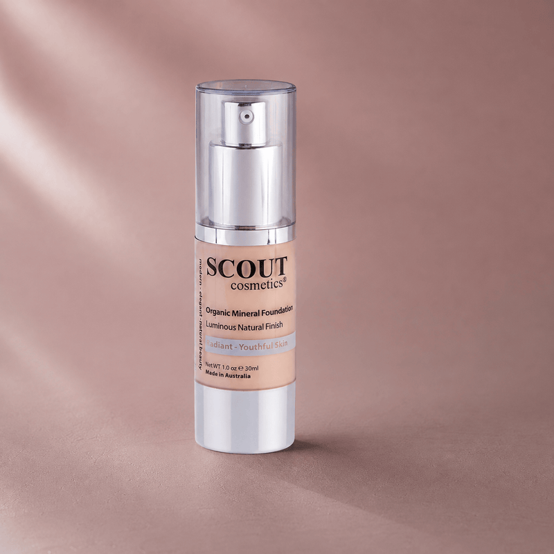 Scout Cosmetics Organic Healthy Glow Fluid Foundation - Shell on a coloured studio background