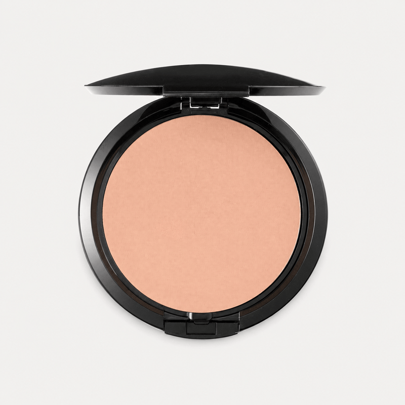 Scout Cosmetics Pressed Powder Foundation, centred on pale grey